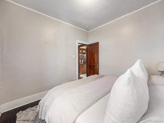 bedroom featuring crown molding