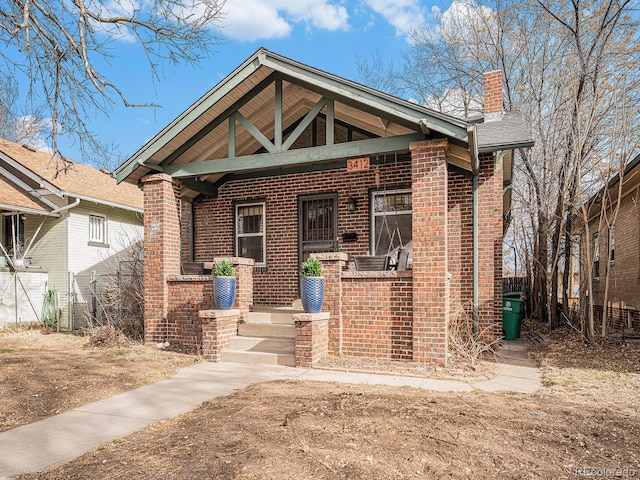 view of front of property featuring covered porch