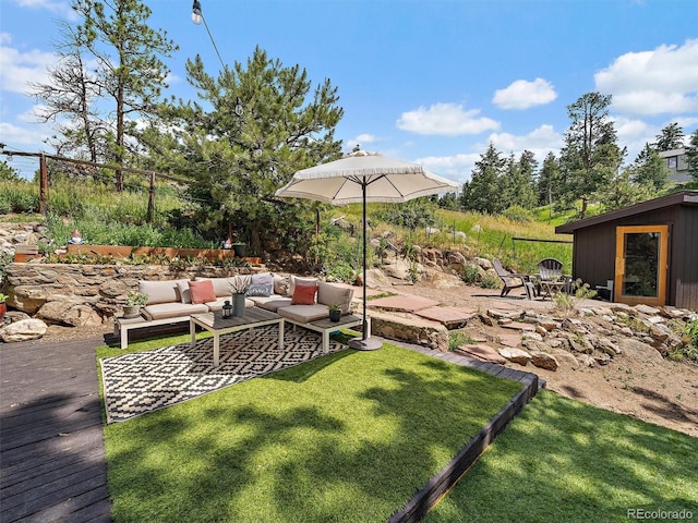 27385 Spruce Ln, Evergreen, CO 80439 - view of yard featuring a deck, a patio area, and an outdoor hangout area