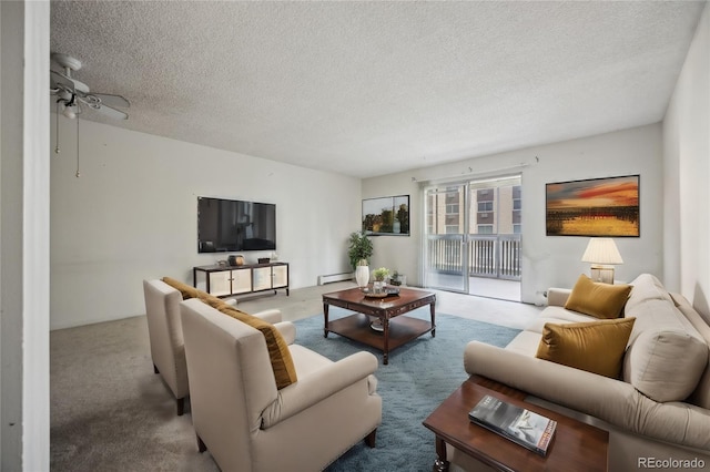 living room featuring ceiling fan, a textured ceiling, and light carpet