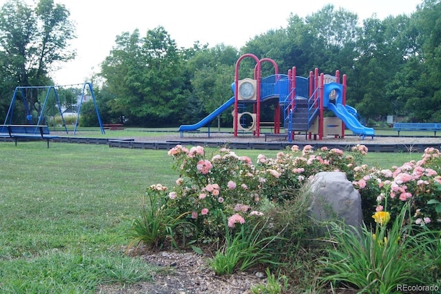 view of playground with a yard