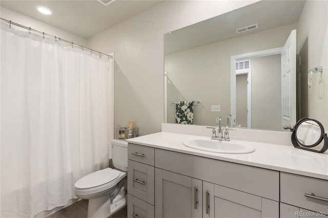 6150 Sugarloaf St, Brighton, CO 80601 - bathroom with vanity, recessed lighting, and wood finished floors
