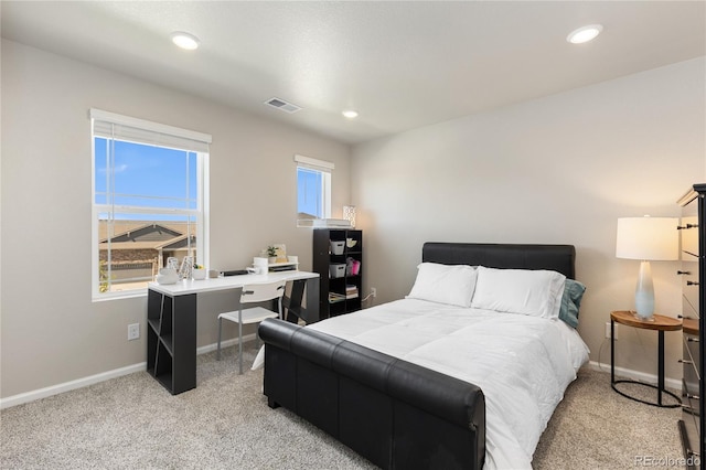 6150 Sugarloaf St, Brighton, CO 80601 - bedroom with light colored carpet and recessed lighting