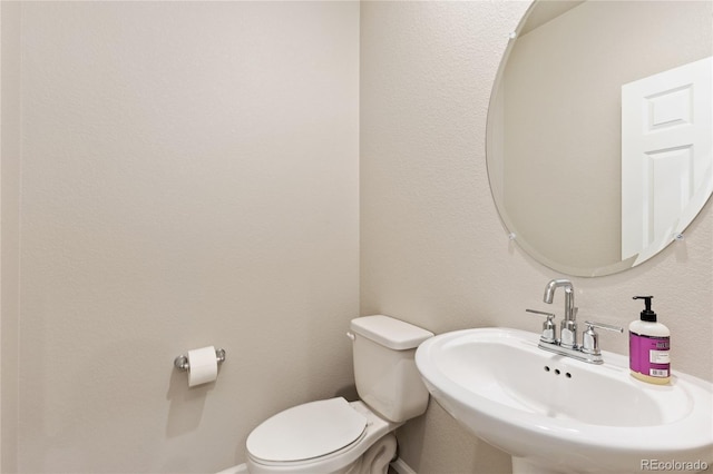 6150 Sugarloaf St, Brighton, CO 80601 - bathroom featuring a sink and toilet