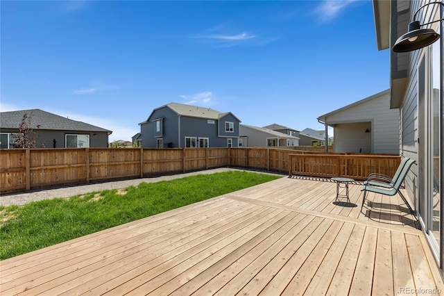 6150 Sugarloaf St, Brighton, CO 80601 - wooden deck with a residential view and a fenced backyard