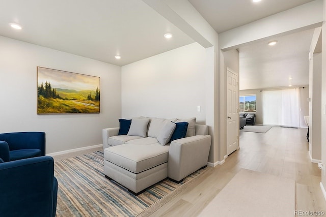 6150 Sugarloaf St, Brighton, CO 80601 - living room featuring recessed lighting and light wood finished floors