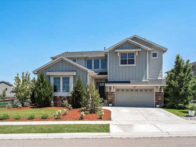 1291 Fountain Ln, Erie, CO 80516 - craftsman inspired home featuring board and batten siding, stone siding, concrete driveway, and an attached garage