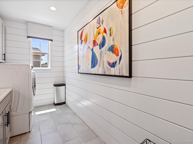 1291 Fountain Ln, Erie, CO 80516 - bathroom with wood walls, washer / clothes dryer, vanity, tile patterned floors, and recessed lighting