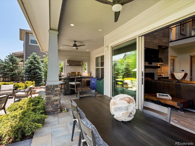1291 Fountain Ln, Erie, CO 80516 - view of patio featuring ceiling fan, exterior bar, and a grill