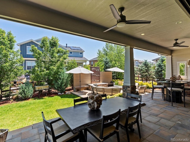 1291 Fountain Ln, Erie, CO 80516 - view of patio / terrace with outdoor dining area and a ceiling fan