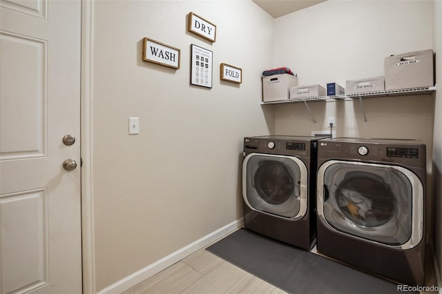 1323 Firestone Dr, Woodland Park, CO 80863 - laundry room with independent washer and dryer and baseboards