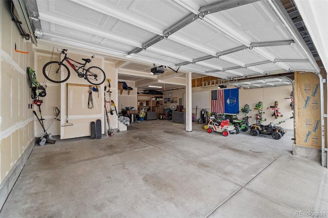 garage featuring a garage door opener