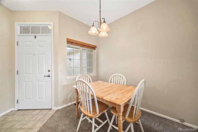 228 Quari St, Aurora, CO 80011 - dining area with a chandelier and light tile patterned flooring