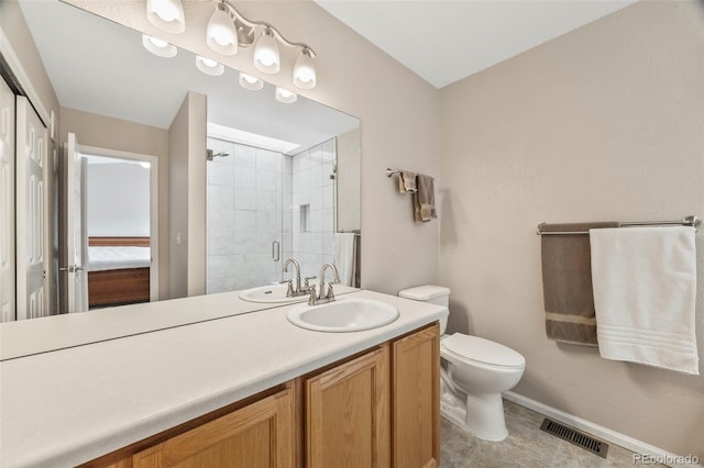 228 Quari St, Aurora, CO 80011 - bathroom featuring vanity and tiled shower