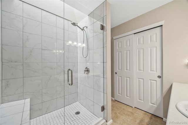 228 Quari St, Aurora, CO 80011 - full bathroom with a stall shower and vanity