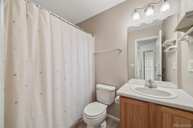 228 Quari St, Aurora, CO 80011 - full bathroom featuring vanity, a textured wall, and curtained shower