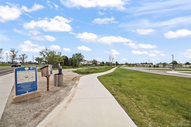 228 Quari St, Aurora, CO 80011 - surrounding community featuring a yard