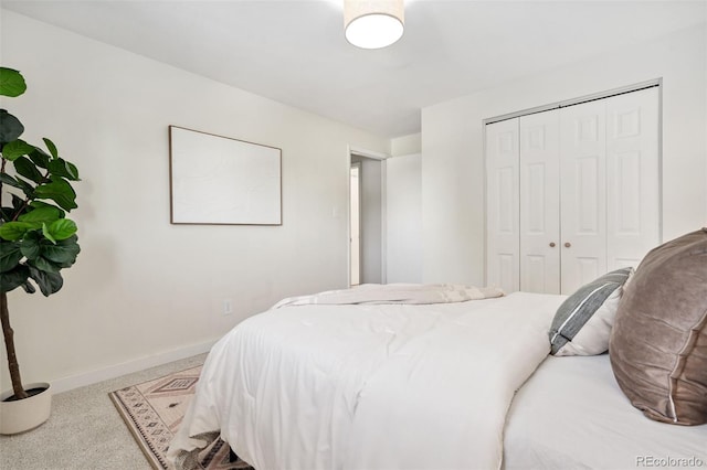 7565 Newland St, Arvada, CO 80003 - bedroom featuring a closet and speckled floor