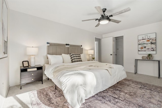 7565 Newland St, Arvada, CO 80003 - bedroom featuring light colored carpet and a ceiling fan