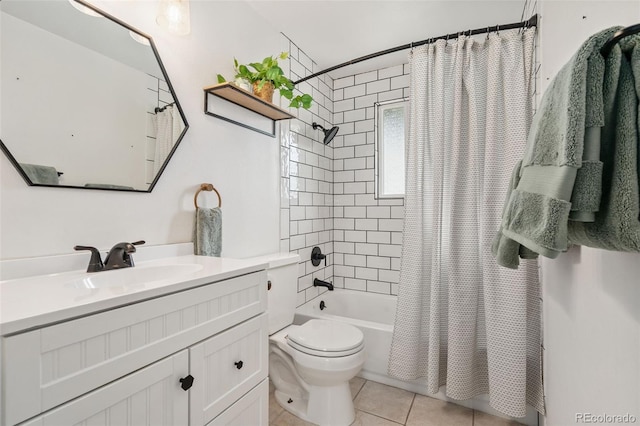 7565 Newland St, Arvada, CO 80003 - full bathroom featuring shower / bath combo with shower curtain, vanity, and tile patterned floors