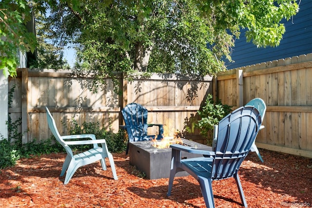 7565 Newland St, Arvada, CO 80003 - view of patio with an outdoor fire pit