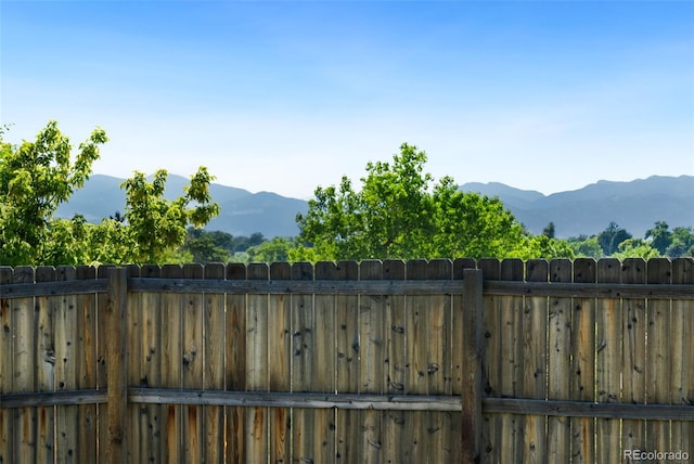 7565 Newland St, Arvada, CO 80003 - view of yard featuring a mountain view