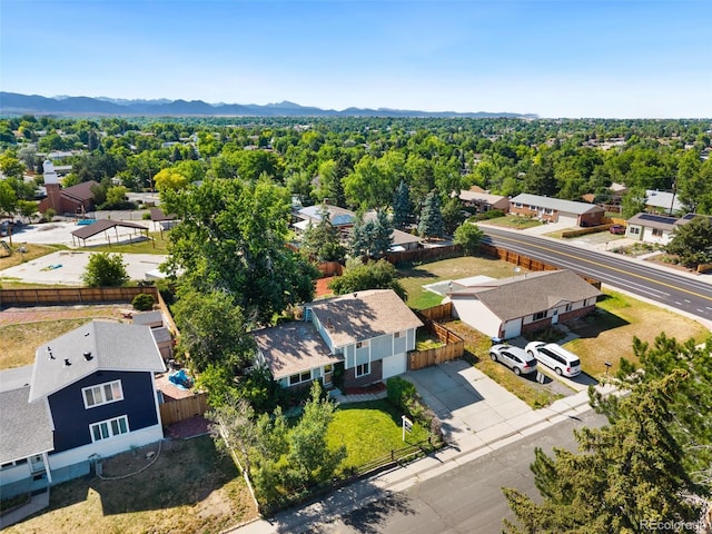 7565 Newland St, Arvada, CO 80003 - aerial view of residential area with mountains
