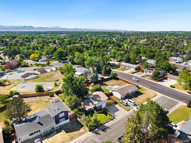 7565 Newland St, Arvada, CO 80003 - aerial view of residential area featuring a mountain backdrop