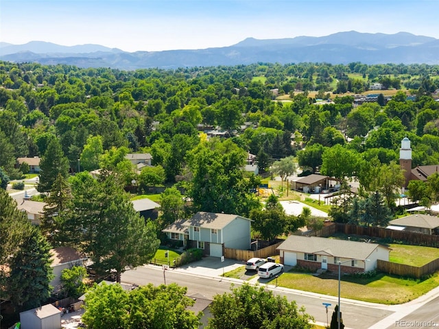 7565 Newland St, Arvada, CO 80003 - aerial view of residential area featuring mountains