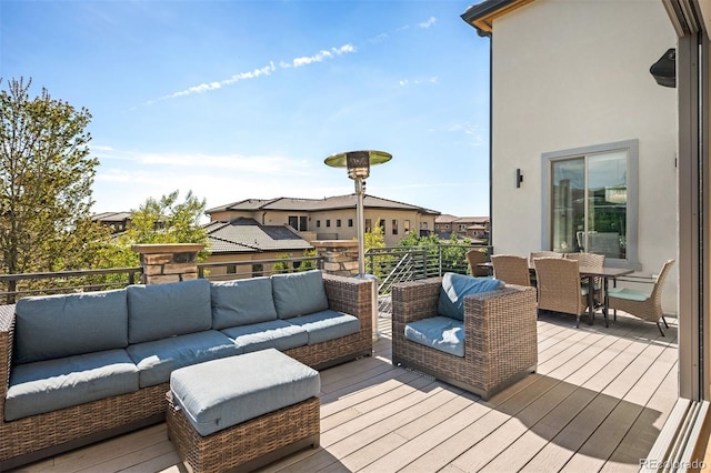 2136 S Juniper St, Lakewood, CO 80228 - deck featuring an outdoor living space and outdoor dining space