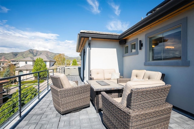 2136 S Juniper St, Lakewood, CO 80228 - balcony featuring a mountain view and outdoor lounge area