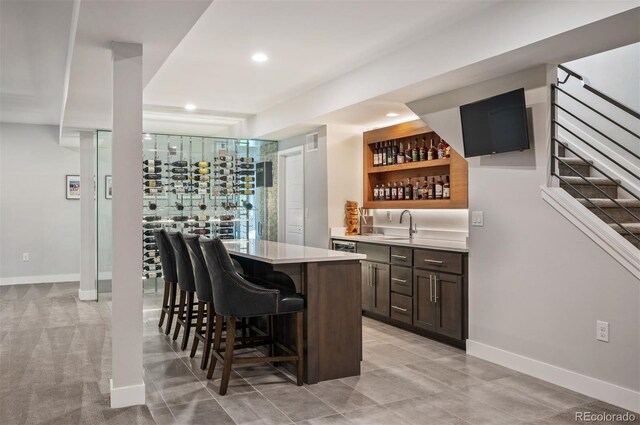 2136 S Juniper St, Lakewood, CO 80228 - indoor wet bar with baseboards and recessed lighting
