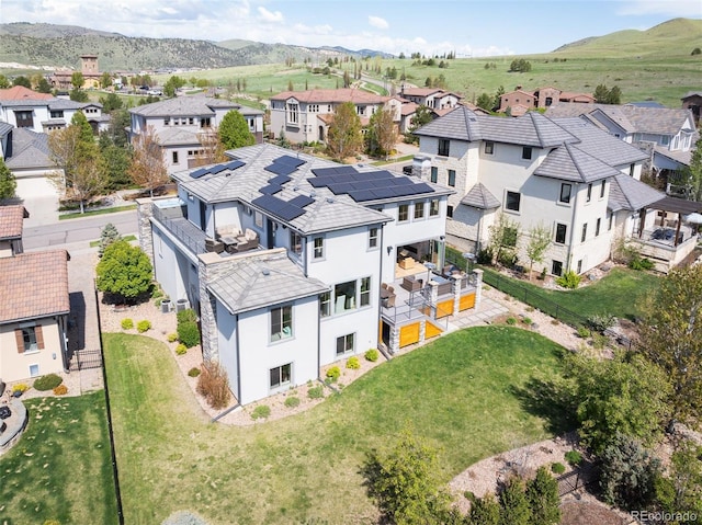 2136 S Juniper St, Lakewood, CO 80228 - aerial perspective of suburban area featuring a mountain backdrop