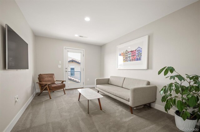 2136 S Juniper St, Lakewood, CO 80228 - carpeted living area featuring baseboards and recessed lighting