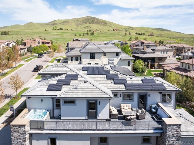 2136 S Juniper St, Lakewood, CO 80228 - aerial view of residential area featuring a mountainous background