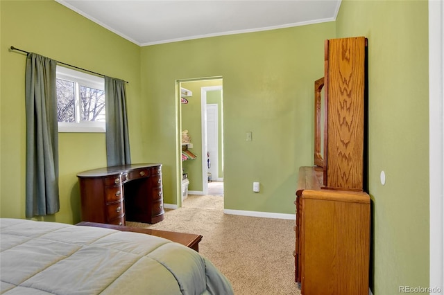 bedroom featuring carpet, ornamental molding, and baseboards