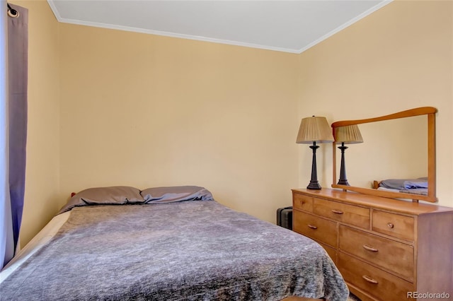 bedroom with crown molding