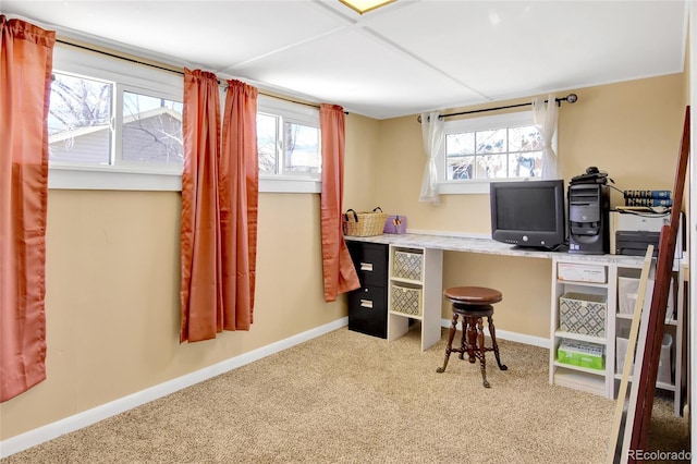 carpeted office featuring a wealth of natural light and baseboards