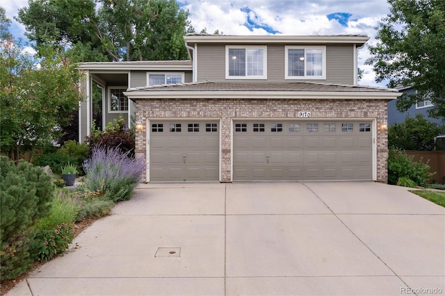 view of front of home featuring a garage and driveway