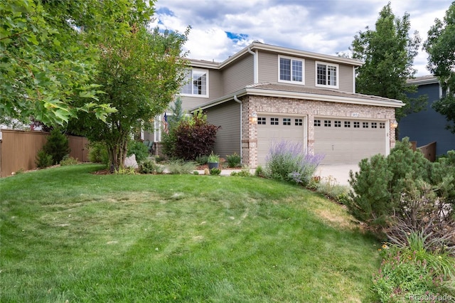 view of front of home with a front yard, a garage, fence, concrete driveway, and stone siding