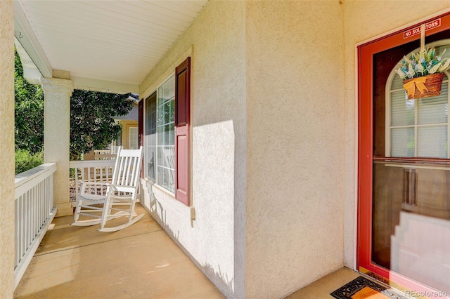 balcony featuring a porch