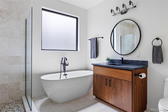 full bathroom with plus walk in shower, vanity, toilet, and tile patterned flooring