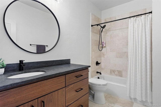 full bathroom featuring tile patterned floors, shower / bath combo with shower curtain, vanity, and toilet