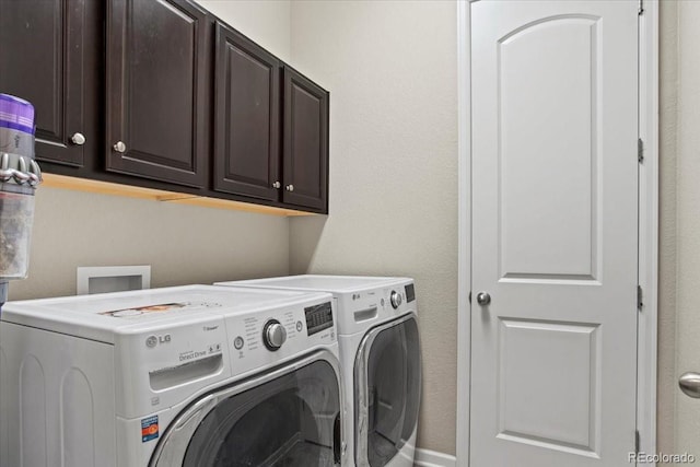 7790 S Queensburg Way, Aurora, CO 80016 - washroom with cabinet space and washing machine and dryer