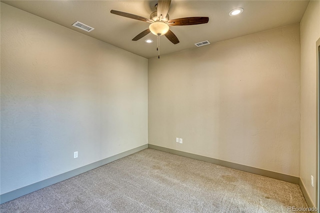 carpeted empty room with ceiling fan