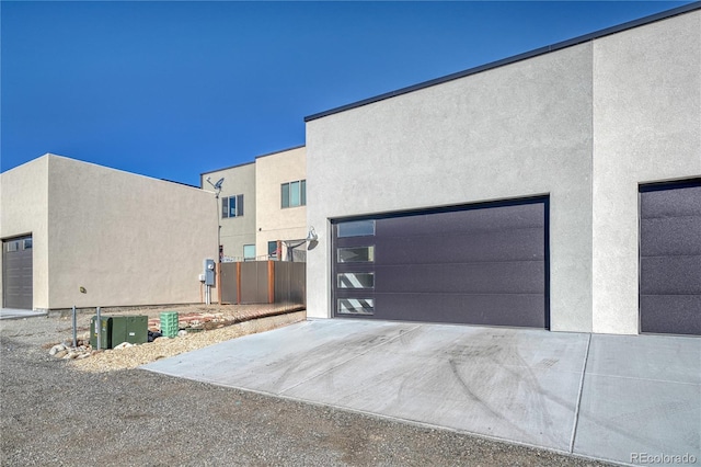 view of side of property with a garage