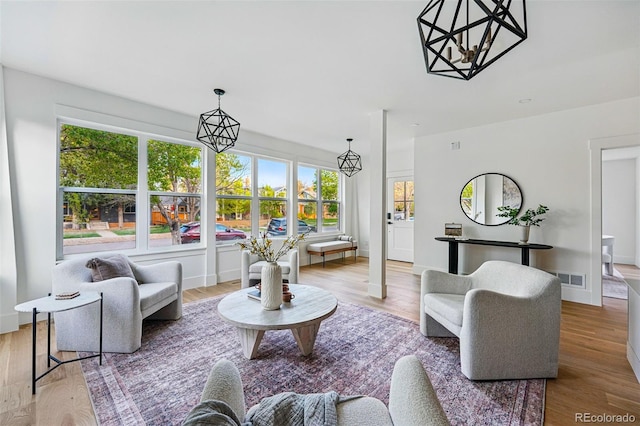 2391 Hudson St, Denver, CO 80207 - living room with wood finished floors and baseboards