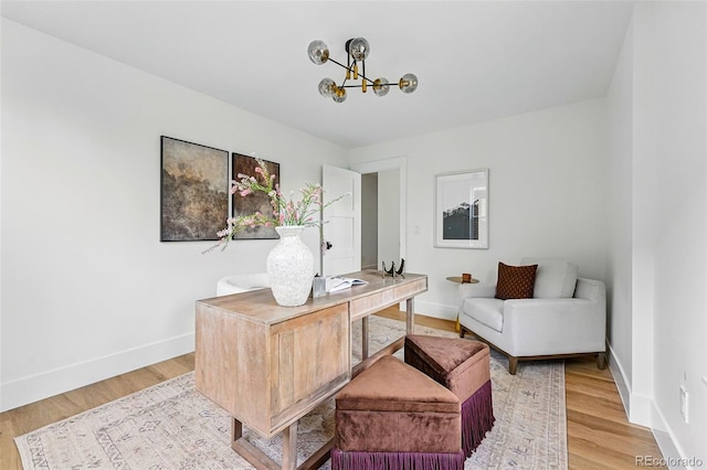 2391 Hudson St, Denver, CO 80207 - office space featuring a chandelier, light wood-style flooring, and baseboards