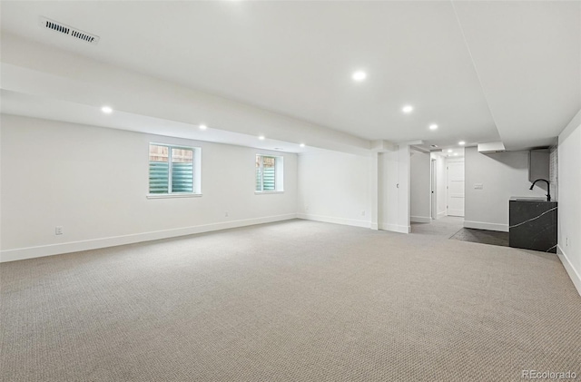 2391 Hudson St, Denver, CO 80207 - below grade area featuring recessed lighting, carpet, and baseboards