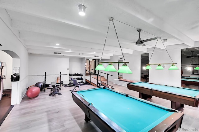 playroom with visible vents, beam ceiling, wood finished floors, arched walkways, and billiards